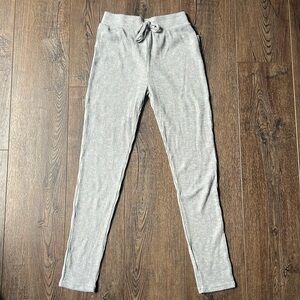 Light gray and white Gymshark skinny joggers